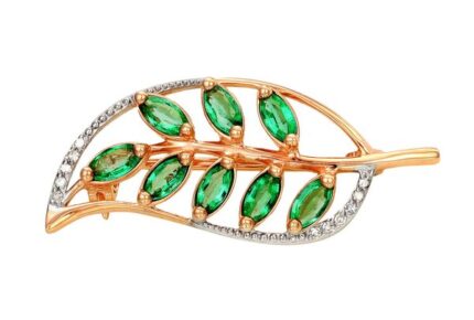 Gold brooch with diamonds and emeralds