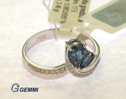 Gold ring with diamond and sapphire